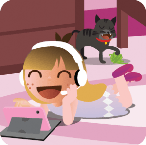 a child lying on the ground with headphones looking into a telephone and a black cat in the background
